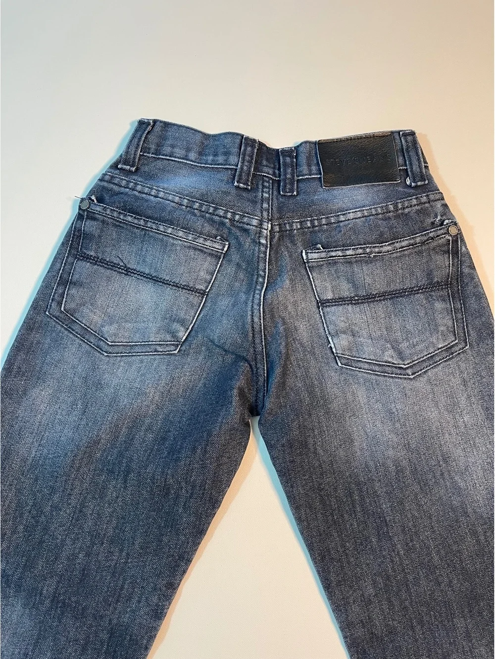 Girls size 10 Steve's Jeans Distressed Blue Denim Jeans with Front Rip Detail